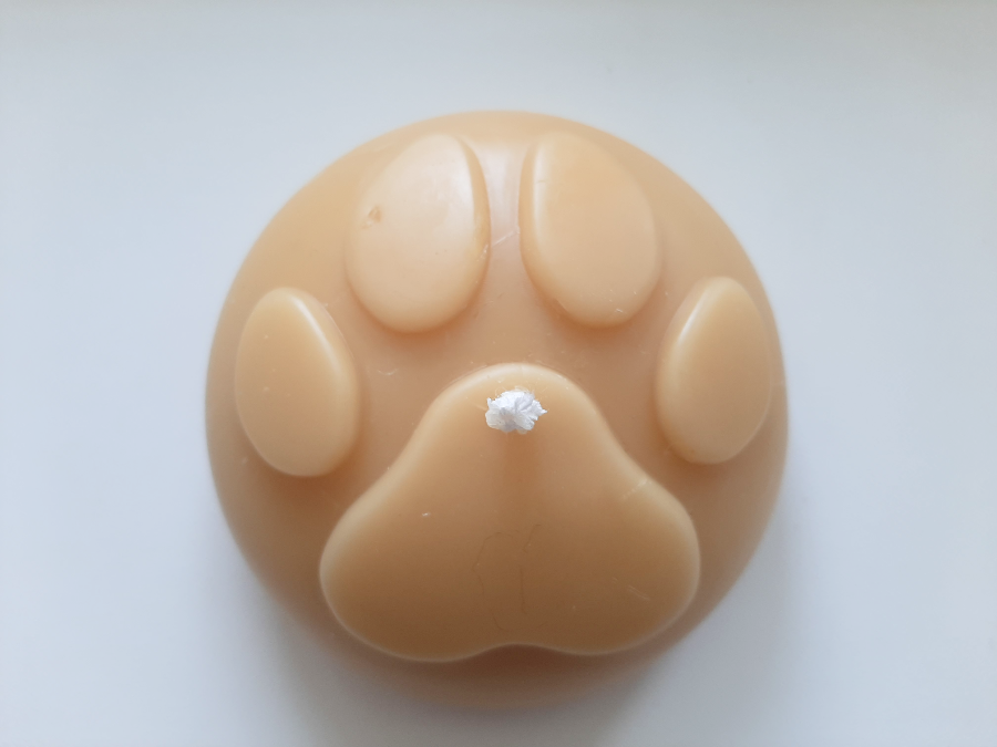 Paw print candle