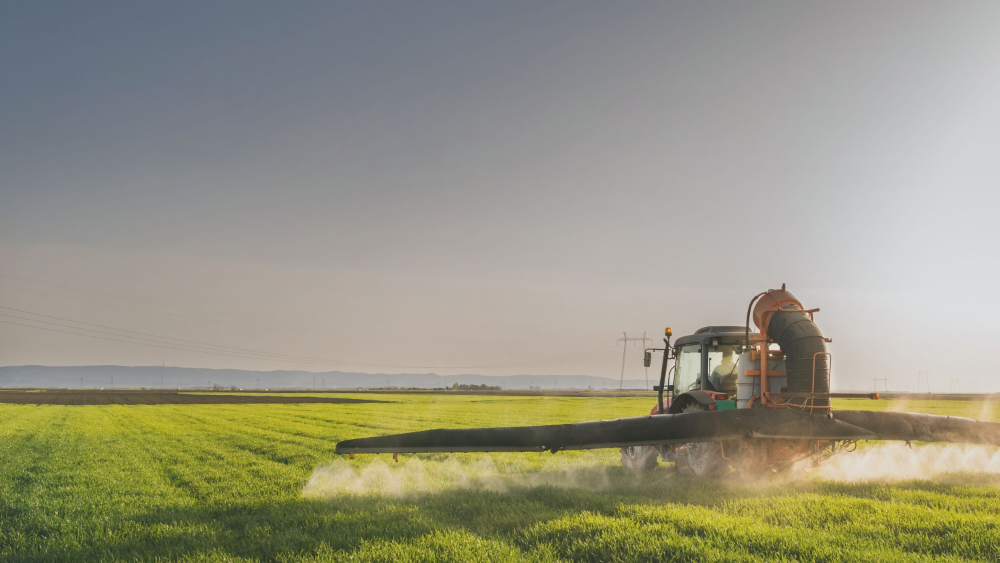 Spraying field with chemicals